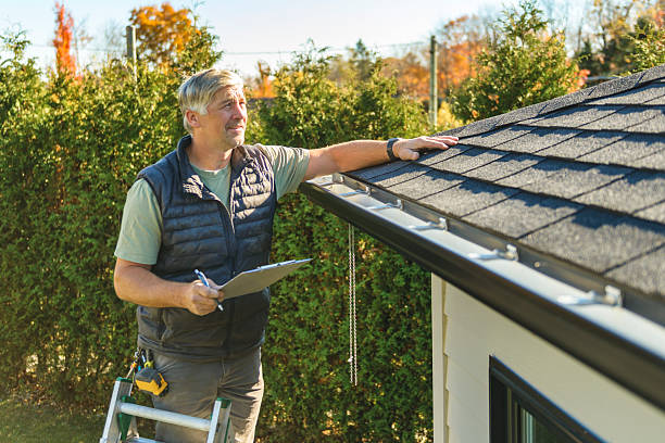 Professional Roofing technician working in Skandia, MI